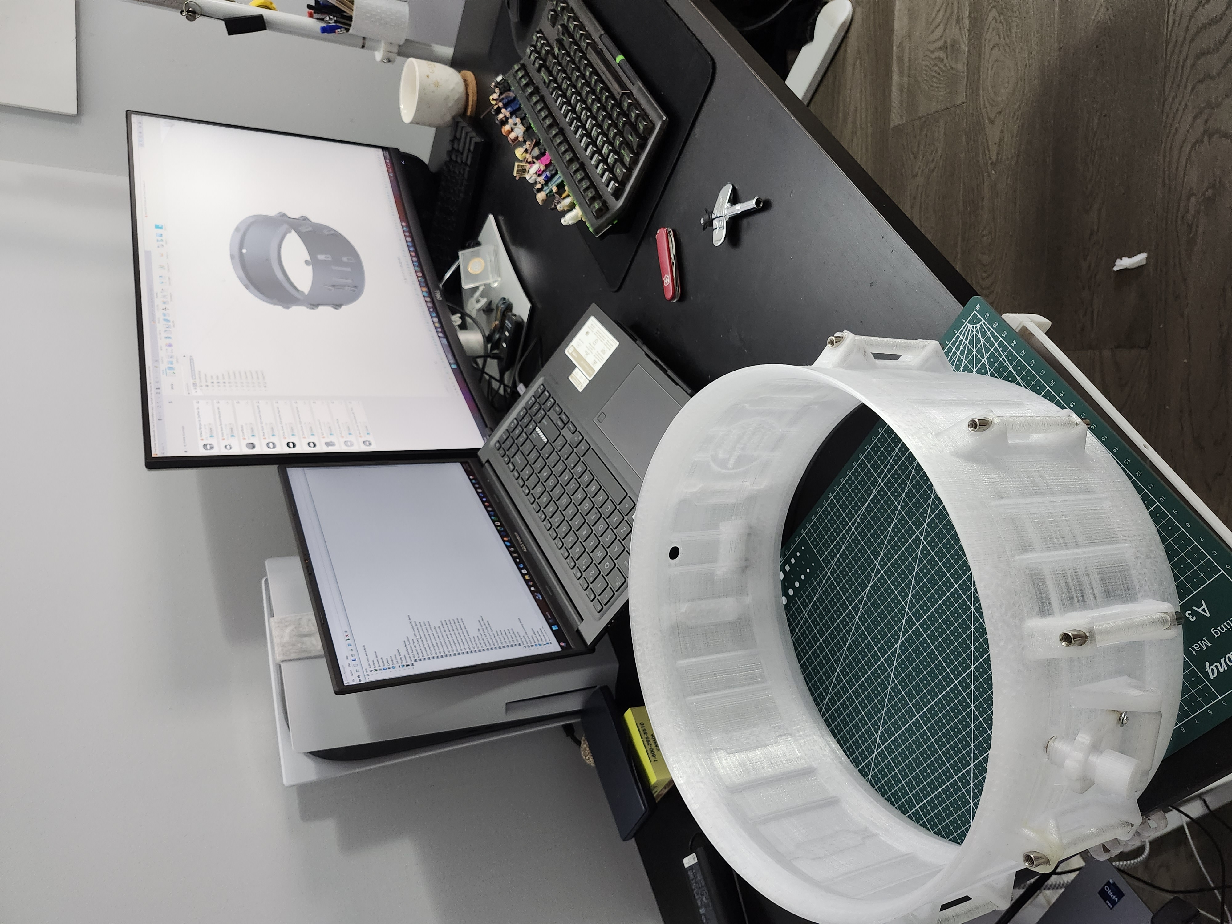 The Falcon Drums R&D station: CAD design on screen, freshly printed tom shell prototype on the workbench